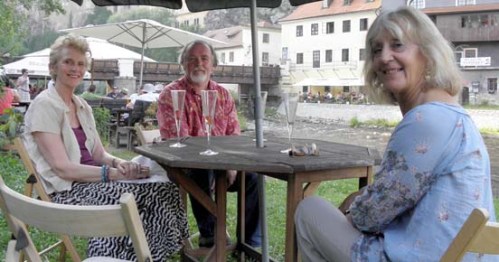 socializing on the banks of the Vltava